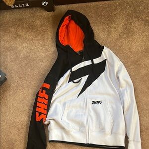 Shift Black and White Hoodie with Orange Accents